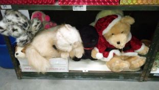 A shelf of assorted soft toys