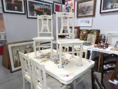 A painted dining table and 6 painted dining chairs