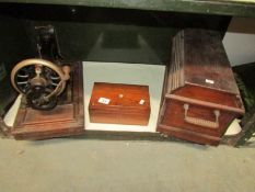 A vintage sewing machine and a small mahogany box