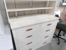 A painted 2 over 3 chest of drawers and shelf