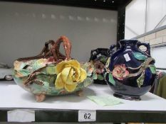 A pair of floral encrusted vases and 2 pottery baskets