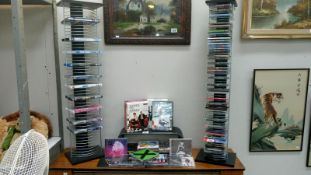 A quantity of CD's including Ed \sheeran & a quantity of Dvd's including Doctor Who etc.