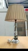 A table lamp with glass
