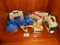 A collection of model vehicles including Lledo, Corgi,