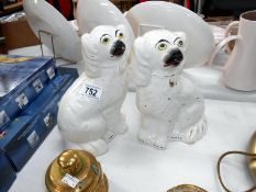 A pair of dog figures