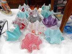 A collection of 13 chance glass handkerchief vases including orange & white