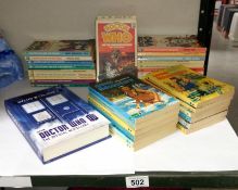 A collection of Doctor Who paperback books and William Price Adventure Stories