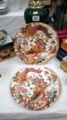 A pair of Royal Crown Derby Olde Avesbury plates