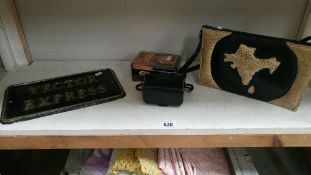 A handbag with crocodile hide & a Vector Express cast sign etc.