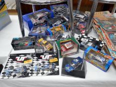 A quantity of boxed Formula 1 & rally cars including Onyx,