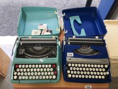 2 Smith-Corona portable typewriters