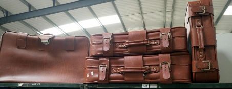 4 leather suitcases