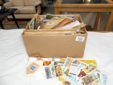 A quantity of stamps including proof sets & tea cards etc.