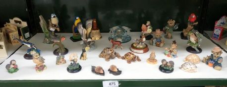 A quantity of animal and bird figurines