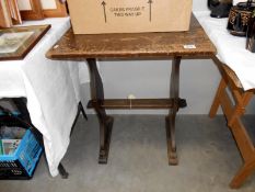 A small size solid oak hall table