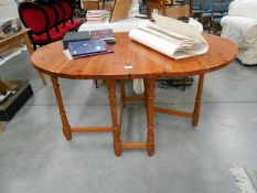 A pine gateleg table