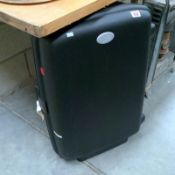 An American Tourister suitcase