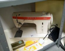 A Singer Stylist sewing machine