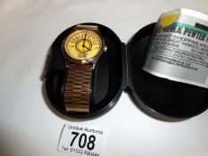 A wristwatch with sun records dial in case