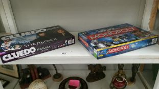 A boxed Sherlock cluedo boards game & Doctor Who monopoly board game