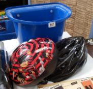 2 bicycle helmets 1 being Dennis the Menace & a bicycle box