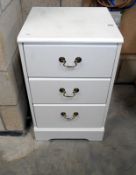 A bedside cabinet with 3 drawers