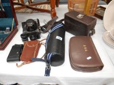 A collection of old camera's, lenses etc.