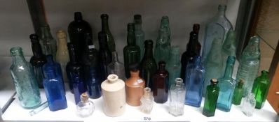 A quantity of 19th & 20th century glass bottles including COD & Poison