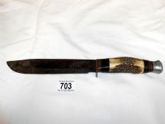 A vintage William Rodgers Sheffield bone handled bowie knife