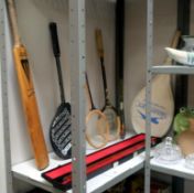 A quantity of sports equipment including squash rackets, cricket bat & snooker cue etc.
