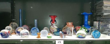 A mixed lot of glassware including paperweights,