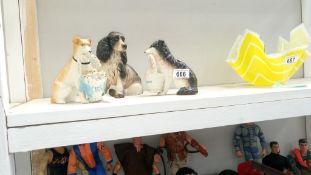 A Goebel spaniel & 2 family cares dog figurines