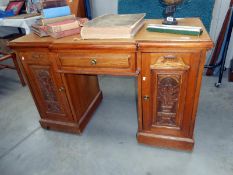 An oak Arts and Crafts desk
