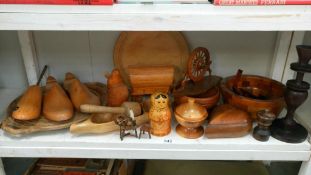 A mixed lot of wooden items including bread board & shoe trees etc.