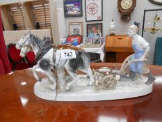A porcelain figure of horse & plough