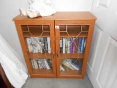 A bookcase with glazed doors
