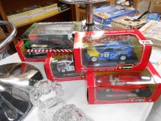 4 boxed Burago rally cars & a large Oxford Die-cast Stobart lorry