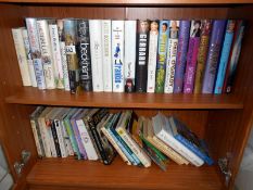 A mixed lot of books including novels,