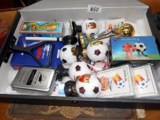 A collection of World Cup related lighters and 5 Espana 82 brandy balls and other memorabilia