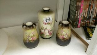 A floris ware vase & a pair of Victorian floral decorated vases