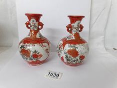 A pair of oriental Khutani vases