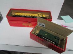 A boxed Triang 00/HO R155 Diesel Switcher and a R152 Diesel Shunter