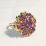 A 9ct gold dress ring set amethysts,