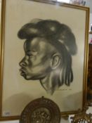 A framed profile study signed Skarbia '58