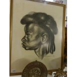 A framed profile study signed Skarbia '58