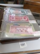 An album of world bank notes