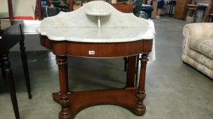 A marble topped mahogany Duchy wash stand