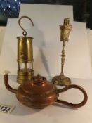 A brass miner's lamp,