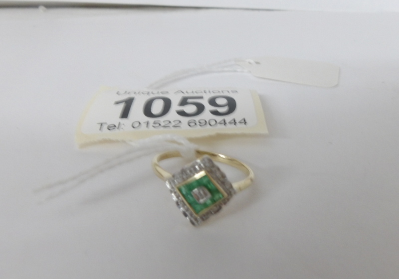 A yellow gold emerald and diamond ring, - Image 2 of 2