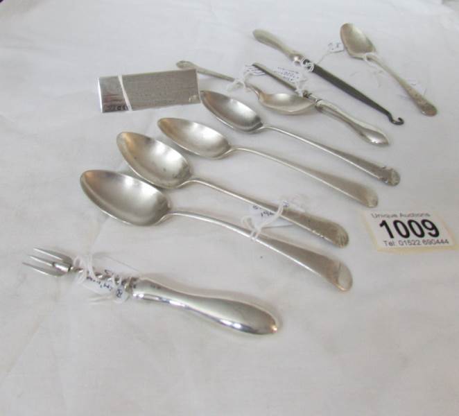 A mixed lot of silver spoons, button hook, plaque etc.